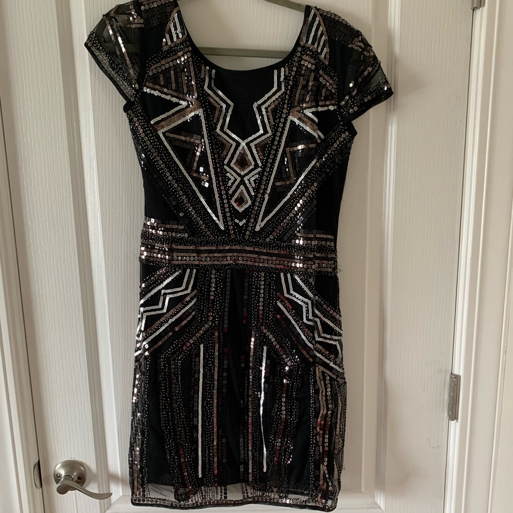 Black sequin cap sleeve dress